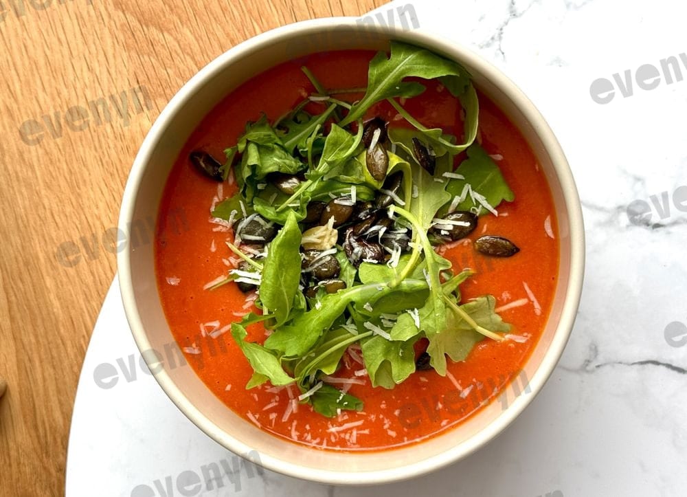 Vegetable soup with pumpkin, courgette and beetroot, a reasonable portion in a bowl