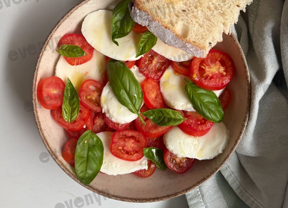 Caprese plate with mozzarella and sourdough bread