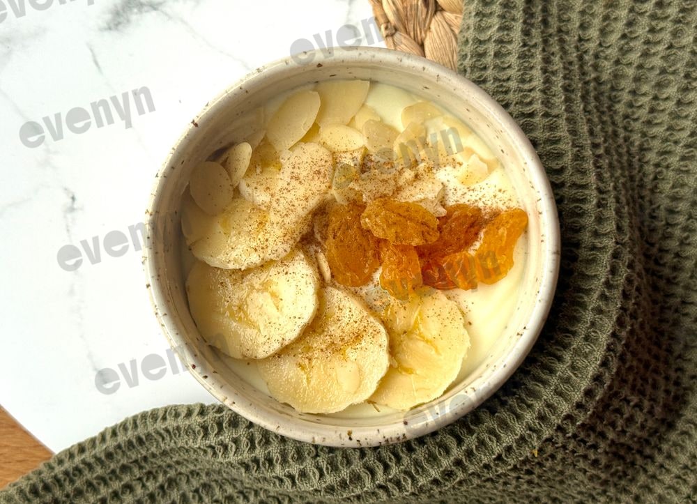 Healthy snack, quark cream with protein pudding and banana